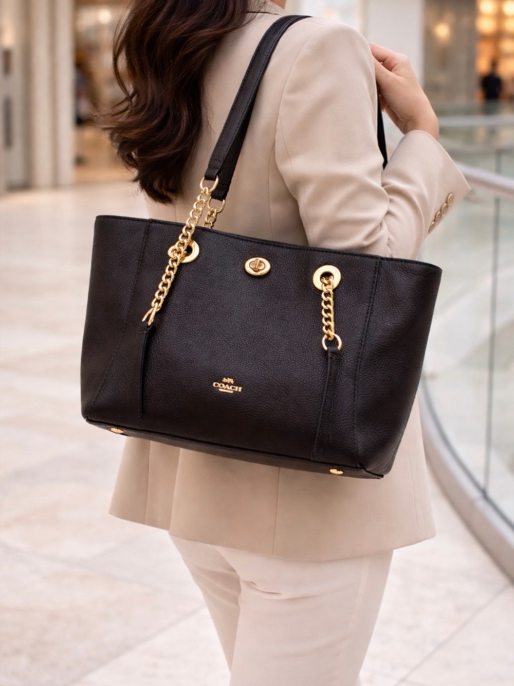 Coach Black Leather Tote with Gold Chain Accents